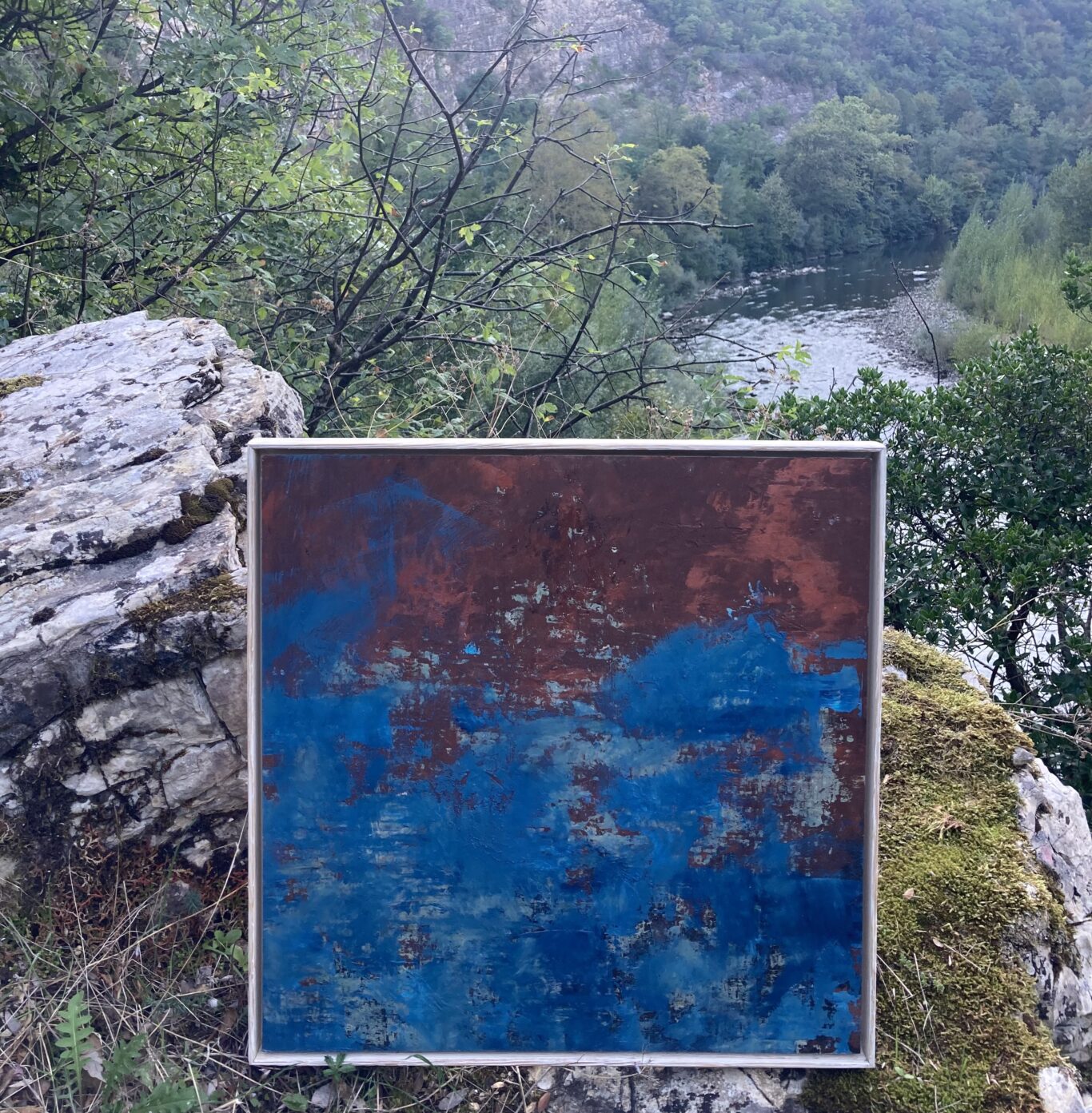 Dipinto astratto moderno materico nelle varianti cromatiche del blu e rame a tema il cielo